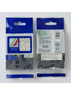 6mm. อักษรขาว พื้นใส สติกเกอร์ PUTY ใช้เทียบกับ BROTHER TZE-115