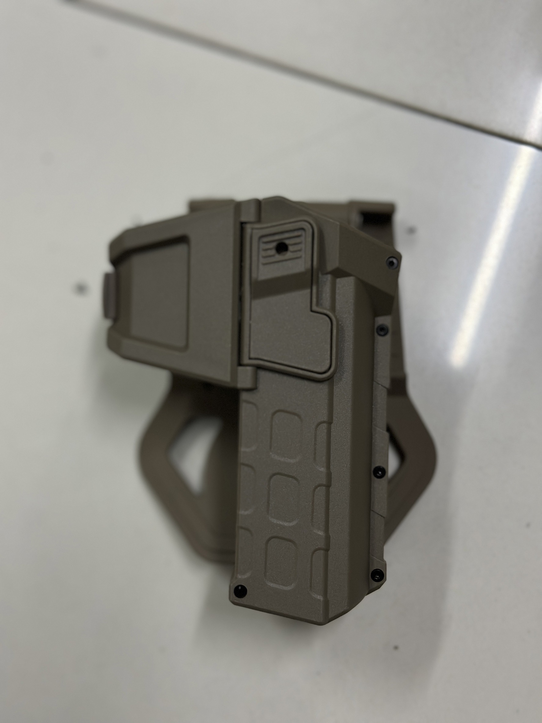 New. ซองปืน G19 ติดไฟฉาย/เลเซอร์ ( G19 Light Bearing Holster ) 🔨 ผลิตจาก Polymer เกรดคุณภาพ 🔨 สำหรับ G19 ที่ติดไฟฉาย/เลเซอร์ ได้ทุกชนิด 🔨 ปลดล็อคนิ้วชี้ ใช้งานปลอดภัย ( ล็อคกับช่องคัดปลอก ) 🔨 ด้านหลังเป็นเพลทเหน็บเข็มขัด