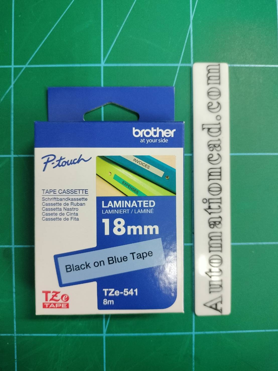 เทปพิมพ์อักษร TZE-541 ขนาด 18 มม. อักษรสีดำพื้นน้ำเงิน แบบเคลือบพลาสติก Brother