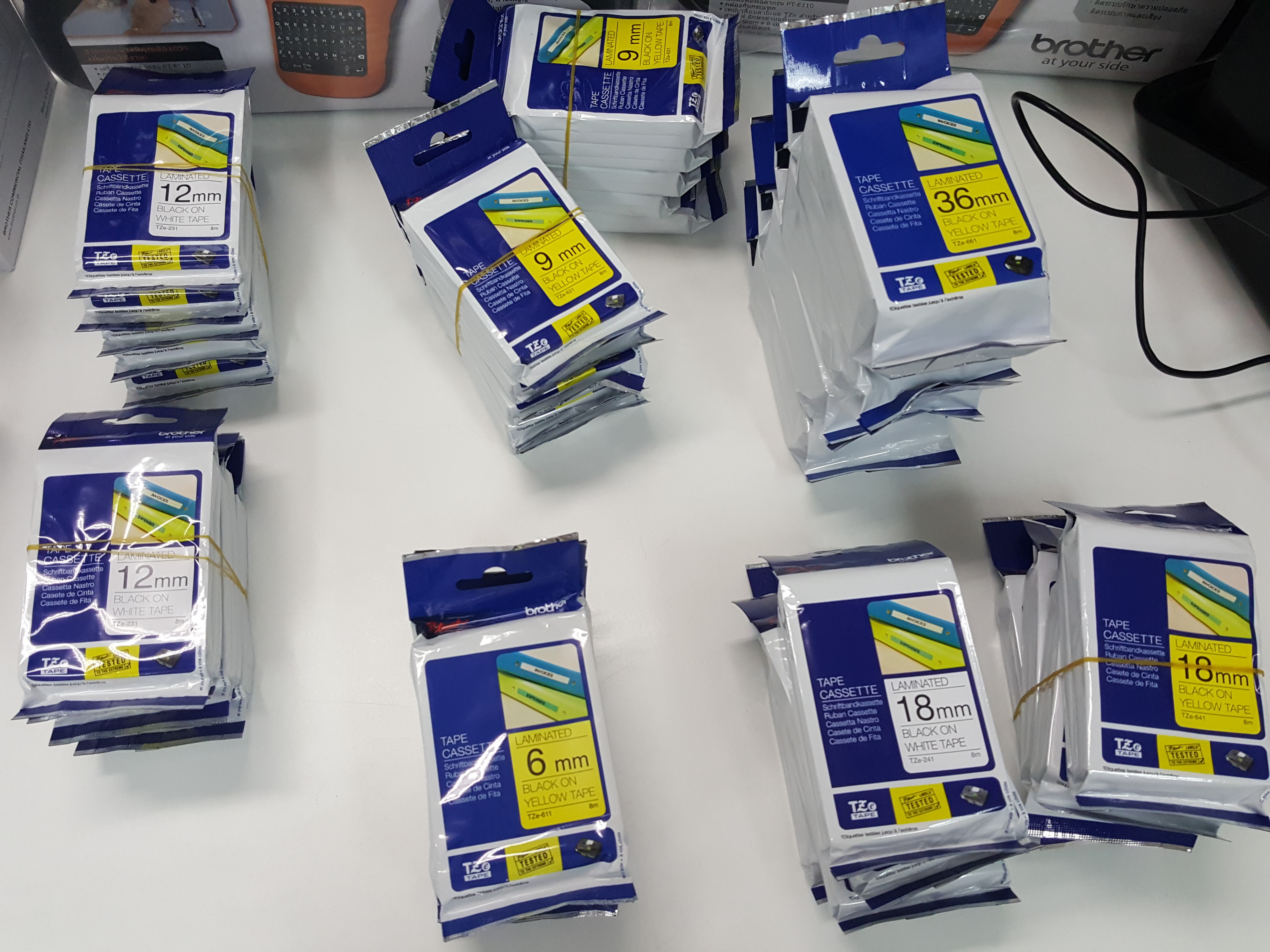 เทปพิมพ์อักษร TZE-221 9 มม. BROTHER ของแท้ ราคาถูก ส่งไว อักษรสีดำ พื้นสีขาว