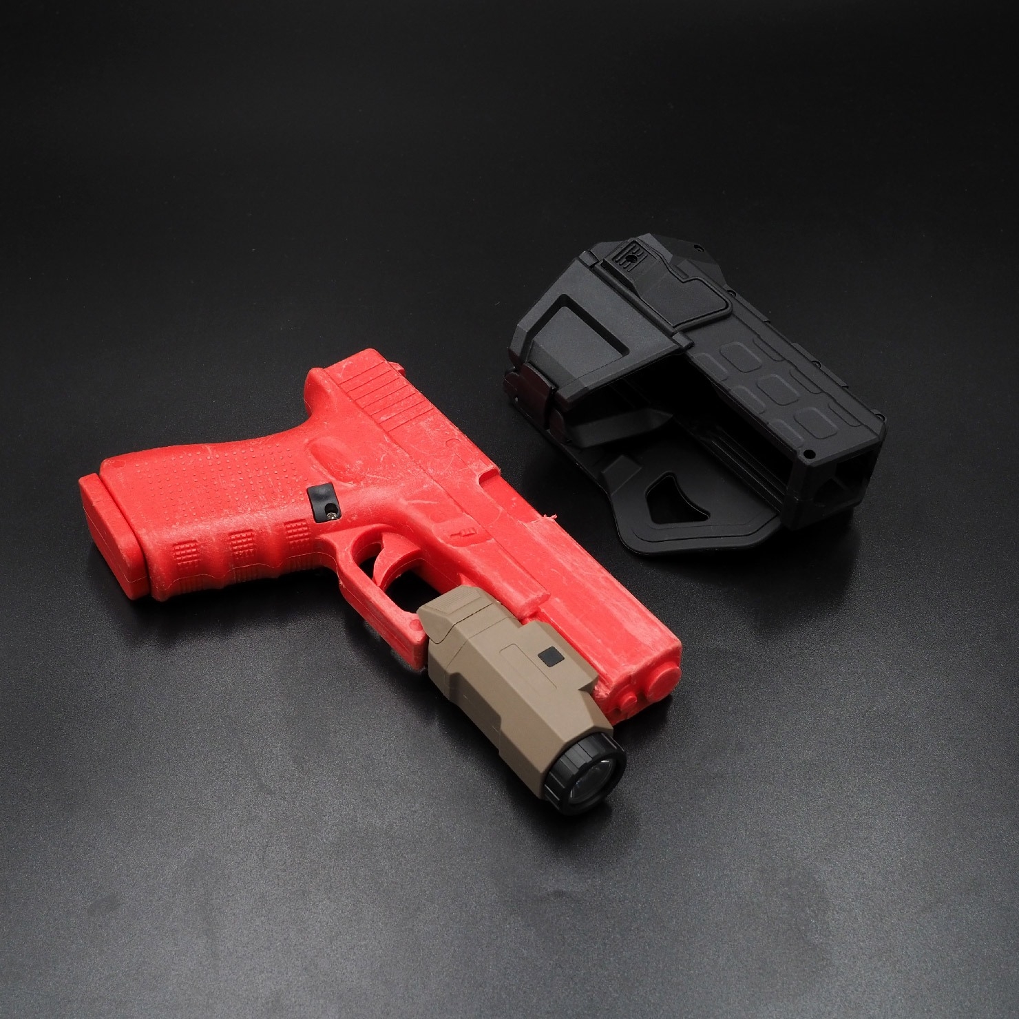 New. ซองปืน G19 ติดไฟฉาย/เลเซอร์ ( G19 Light Bearing Holster ) 🔨 ผลิตจาก Polymer เกรดคุณภาพ 🔨 สำหรับ G19 ที่ติดไฟฉาย/เลเซอร์ ได้ทุกชนิด 🔨 ปลดล็อคนิ้วชี้ ใช้งานปลอดภัย ( ล็อคกับช่องคัดปลอก ) 🔨 ด้านหลังเป็นเพลทเหน็บเข็มขัด