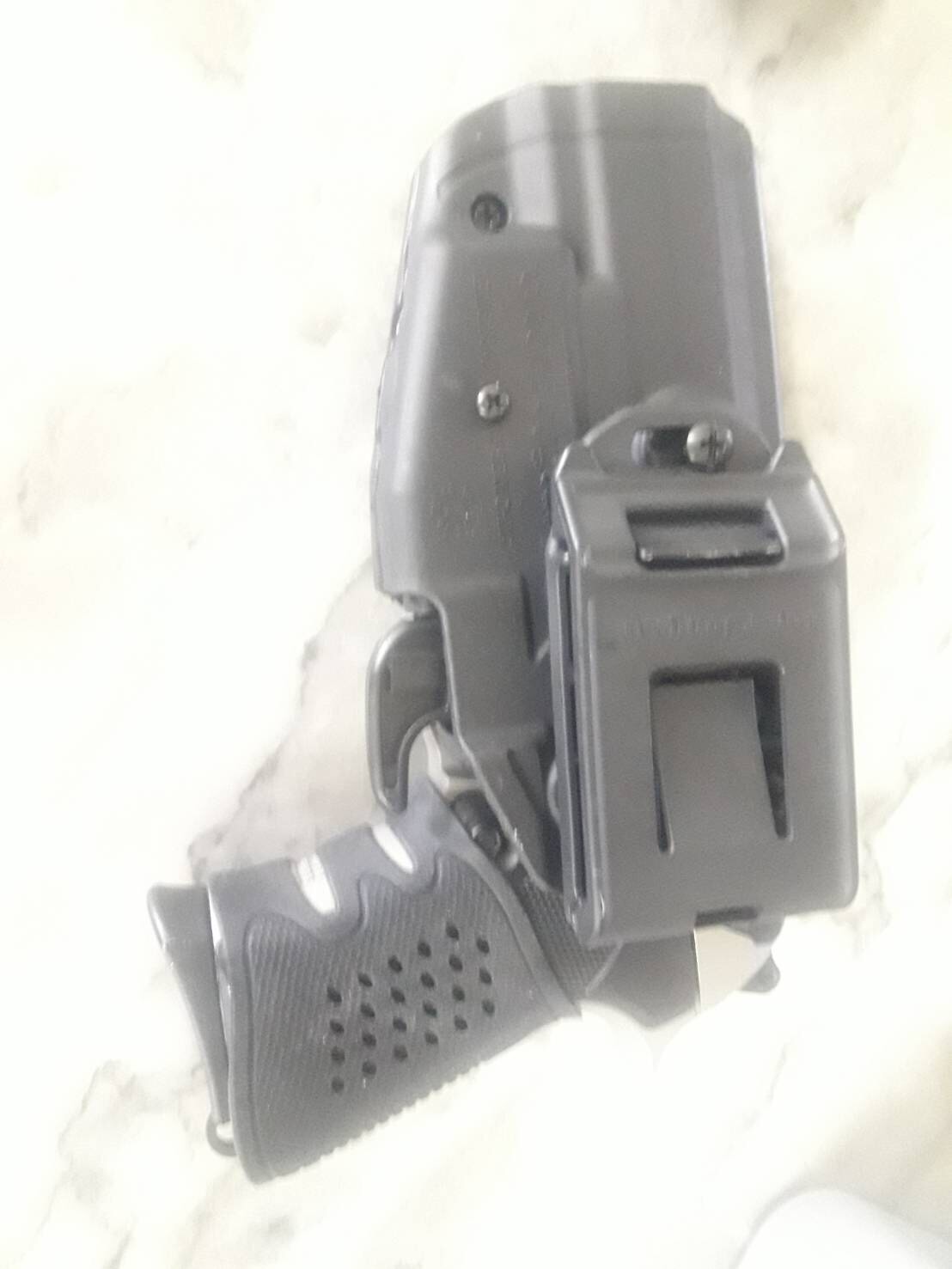 New.📌ซองปืนปลดเร็ว Emersongear 579 GLS Pro-Fit Holster ผลิตจากพลาสติกไนลอน ใช้ระบบล็อคแบบ GLS (ล็อคบริเวณโกร่งไก) สามารถใส่ได้กับปืนมากมายหลายรุ่น ไม่ว่าจะเป็น Glock, Hi-capa, Sig Sauer, beretta, S&W, H&K, Colt, CZ เป็นต้น ข้างในซองมีผ้ากำมะหยีรอง