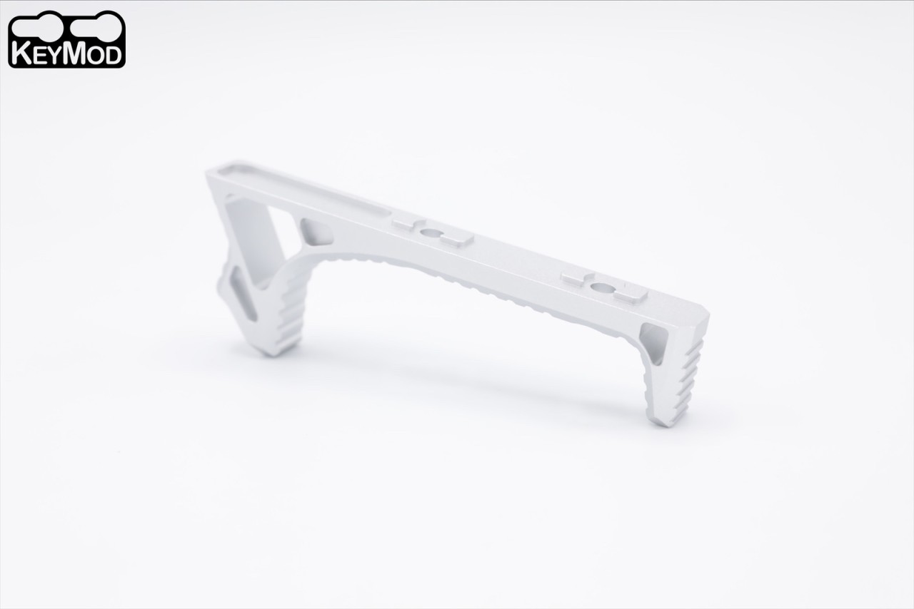 กริ๊ปมือหน้า ยี่ห้อ Castellan รุ่น Curve Foregrip CNC Keymod (ใช้ได้กับชุดหน้าระบบราง Keymod เท่านั้น) คุณสมบัติ : ผลิตจากอลูมิเนียม น้ำหนักเบา ขนาดกระทัดรัด สามารถใช้ได้กับชุดหน้าระบบราง Keymod ติดตั้งง่าย และ แน่นแข็งแรงทนทาน ขนาดพอดีมือ มี3สีให้เลือก ส