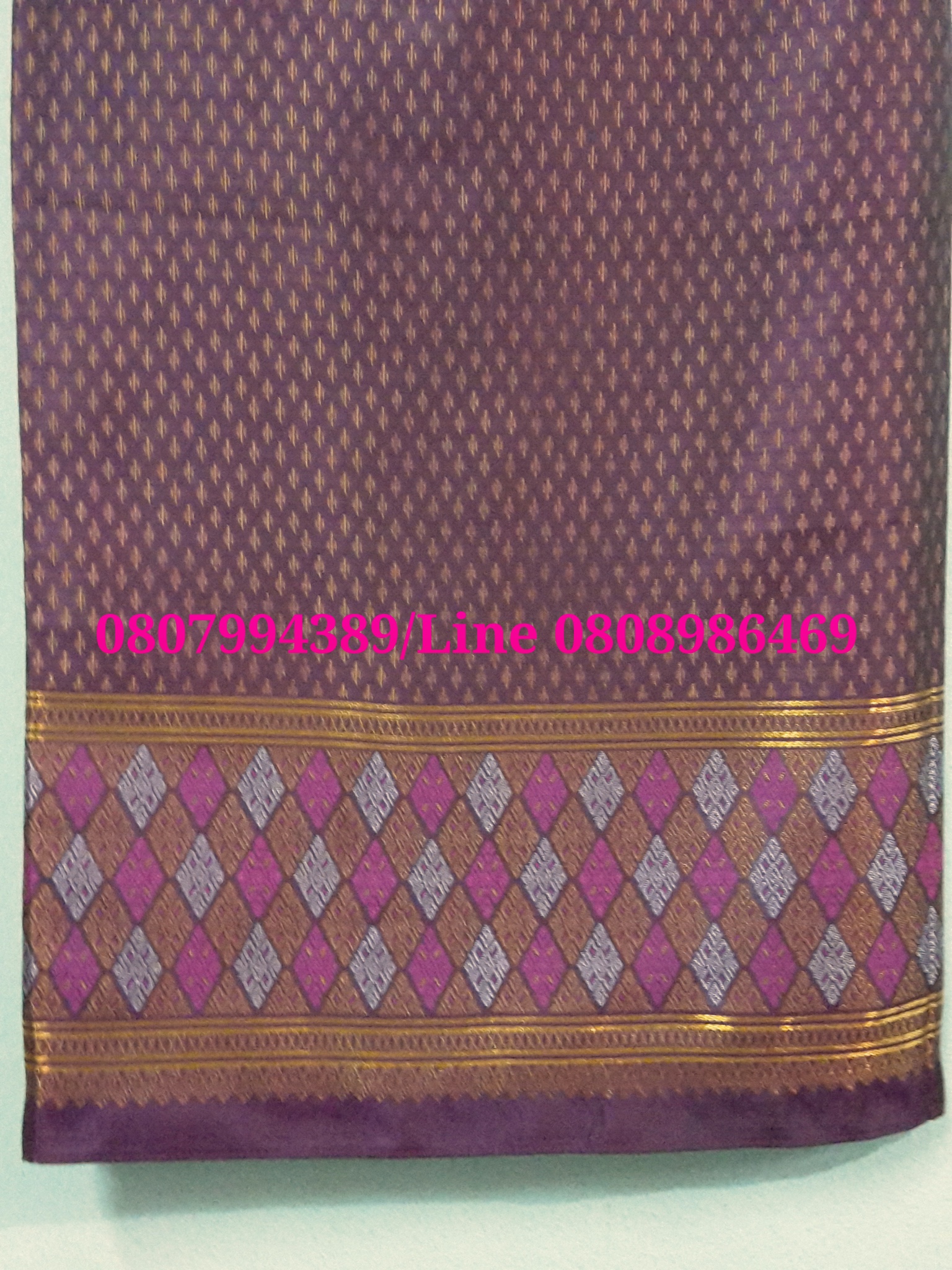 ผ้าซิ่นสำเร็จรูปผ้าซิ่นลาวแบบป้ายเลื่อนตะขอ ผ้าถุงสำเร็จรูป ผ้าซิ่นตีนจกไหมลาวสีม่วงกลีบบัวเมทอลลิค