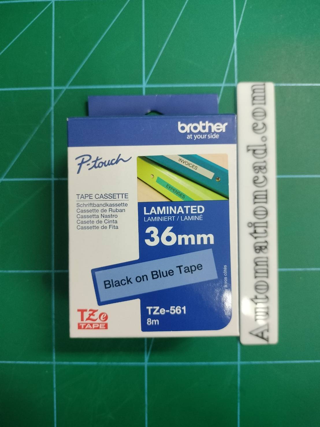 เทปพิมพ์อักษร TZE-561 ขนาด 36 มม. อักษรสีดำพื้นน้ำเงิน แบบเคลือบพลาสติก Brother