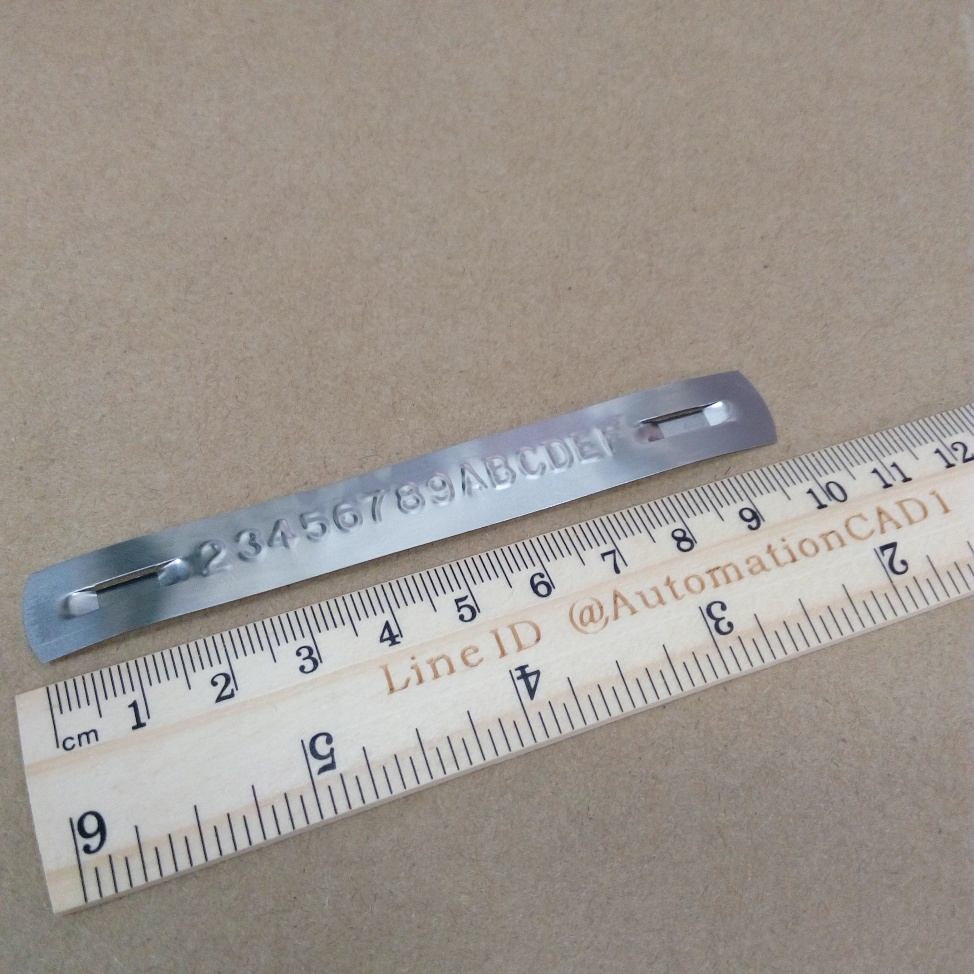 ม้วน TAG สแตนเลส 12mm*6.51m สำหรับเครื่องพิมพ์ DYMO Stainless Steal TAG EMBOSSER
