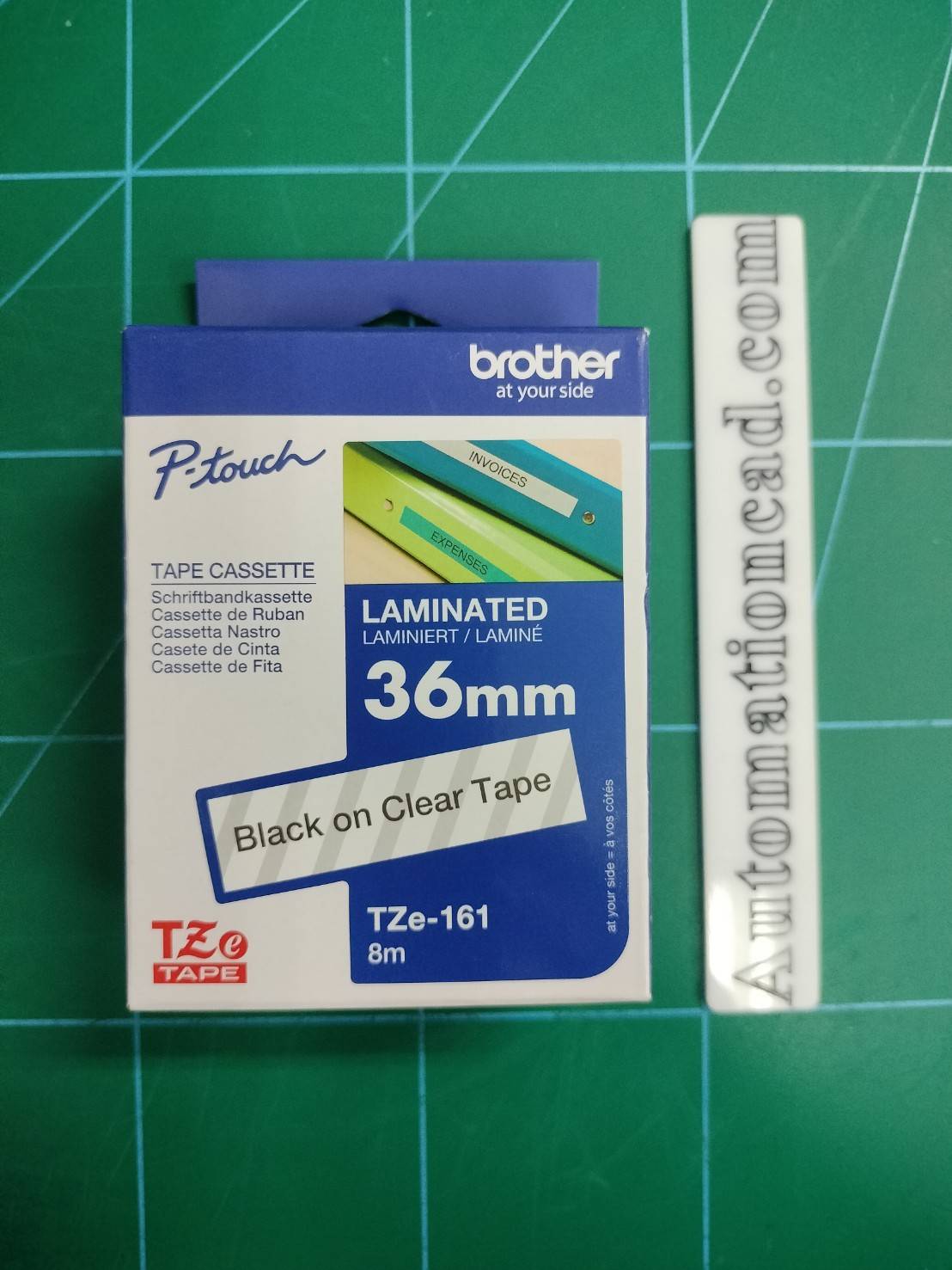 เทปพิมพ์อักษร TZE-161 ขนาด 36 มม. อักษรสีดำพื้นใส แบบเคลือบพลาสติก Brother