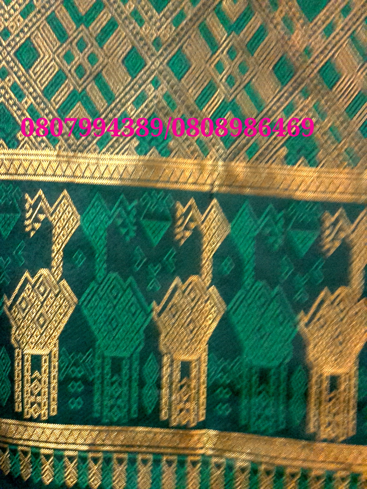 ผ้าซิ่นสำเร็จรูปผ้าซิ่นลาวแบบป้ายเลื่อนตะขอ ผ้าถุงสำเร็จรูป ผ้าซิ่นตีนจกไหมลาวสีเขียวเมทอลลิค