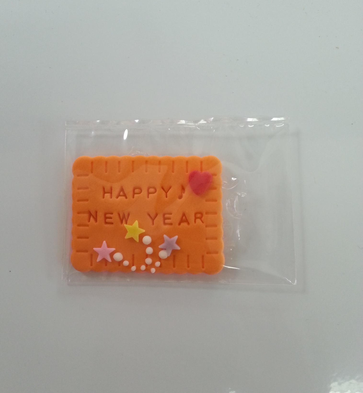 ป้าย นํ้าตาลแต่งหน้า HAPPY NEW TEAR ส้ม 15g.