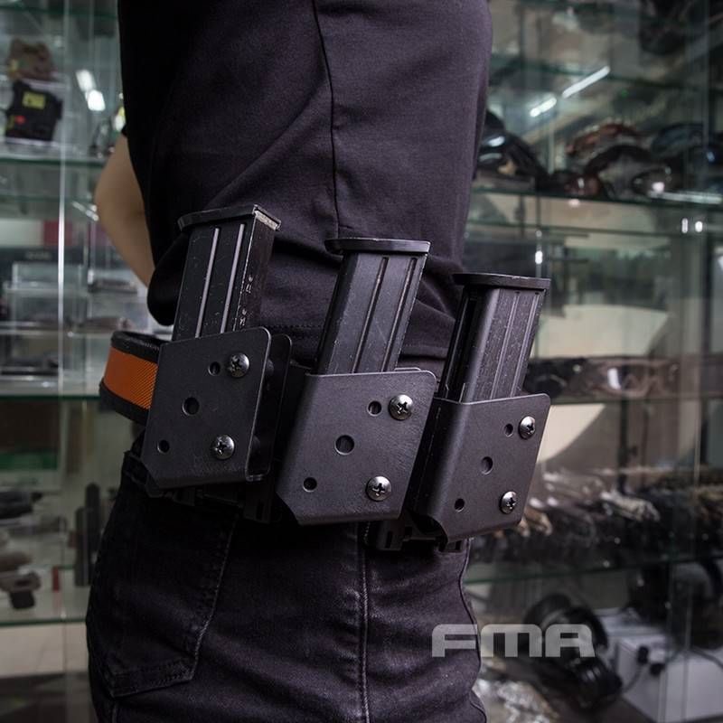 FMA IPSC 9mm pouch ซองแม็กกาซีน 9 mm. 3 แถวเรียง ยึดบนแผ่น flexible plate โค้งรับลำตัว ระบบล็อค Teklok 2 จุด มั่นใจทุกการเคลื่อนไหว ตัวล็อคสามารถปรับขนาดตาม ไซส์เข็มขัดได้ น้ำหนักเบา เพียง 230 g. สีดำ ราคาส่ง 1,500 บาท