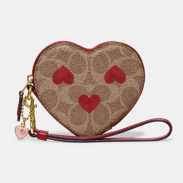 กระเป๋า Coach แท้ รุ่น Coach CF283 Heart Wristlet In Signature Canvas With Heart Print