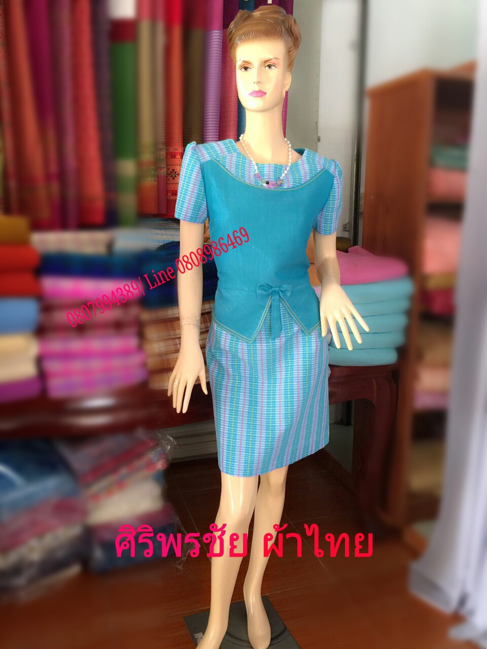 ชุดผ้าไทย ชุดผ้าไทยฝ้ายแพรทอง ชุดผ้าไทยผ้าพื้นเมือง ชุดผ้าไทยฝ้ายแพรทองแต่งลายบลูเบอร์รี่ ชุดทำงานผ้าไทยเอวระบายาฟ้า สำเนา