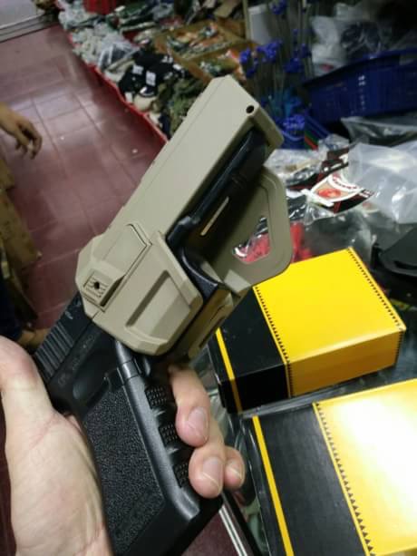 New.Tactical airsoft hunting rifle Movable Holsters Glock gun holster CL7-0057 ใส่ปืน Glock ได้ทุกรุ่น พร้อมติดไฟฉายได้ สีดำ สีทราย ราคาพิเศษ