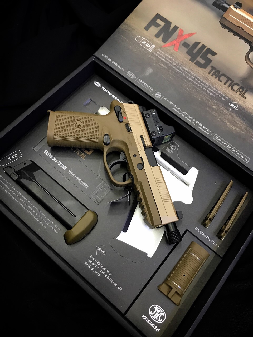 New Arrival! มาใหม่! TOKYO MARUI - FNX-45 Tactical (GBB) - 1 Tokyo Marui FNX-45 Tactical - 1 Spare magazine (29 bbs) - 4 Backstraps (Checker type S/M, Rib type S/M) - 1 Safety cap - 1 User manual - 1 Cleaning rod - 1 Tokyo Marui BBs bag (0.20g/100 bb) ราค
