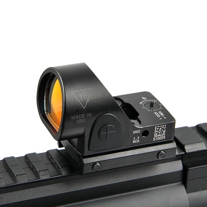 New.Trijicon SRO Red Dot ผลิตจากวัสดุ Aluminum ทำผิว hard anodized ขนาด 2.5 MOA Dot Red dot สีแดง คมชัด รูปร่างขนาดเล็ก Low Profile มาพร้อมขาจับ mount แบบ 20 มม. และ Glock mount ( บีบีกัน ) ปรับระดับความสว่างง่าย +/- ด้านข้าง Battery : 1*CR2032 (แถมมา) แถ